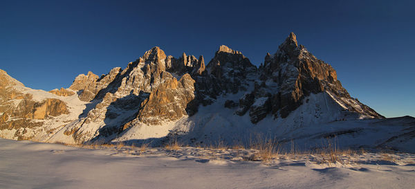 Italy, dolomities unesco heritage. scenic view of snowcapped  montains against clear sky. 