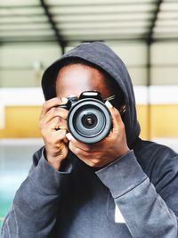 Portrait of man photographing