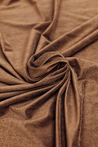 Color of curtains in the interior brown texture