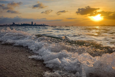 Scenic view of sea against sky during sunset