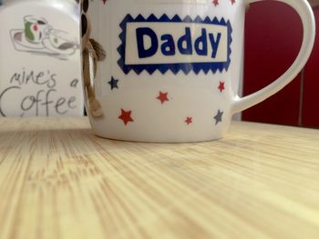 Close-up of coffee cup on table