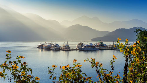 Scenic view of bay against sky