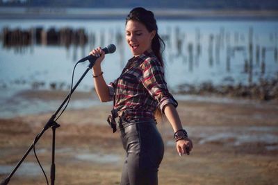 Female singer performing at concert