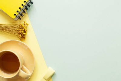 High angle view of coffee cup on table