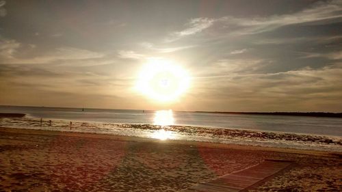 Scenic view of sea at sunset