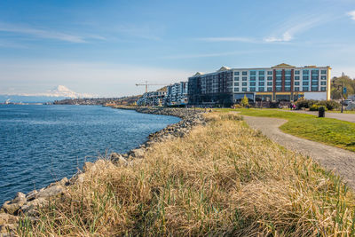 Buildings along the shoreline in ruston, washington are under construction.