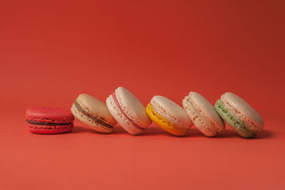 Close-up of cake against red background