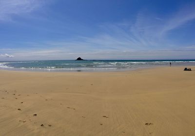 Scenic view of beach against sky