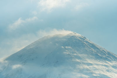 Scenic view of snowcapped mountain against sky