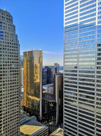 Modern buildings in city against clear sky, rbc plaza building