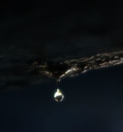 Aerial view of sea against sky at night