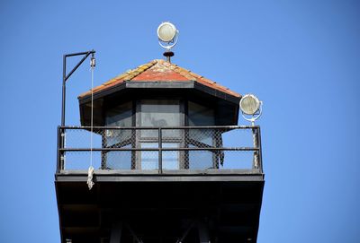 Low angle view of built structure against blue sky