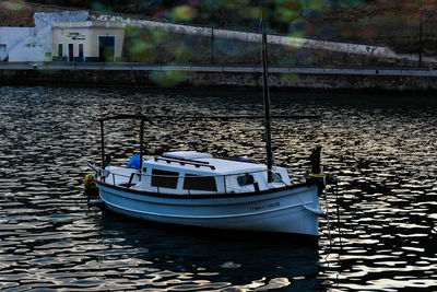 Boat moored in river