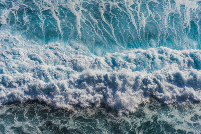 High angle view of waves in sea