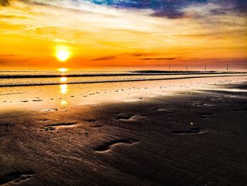 Scenic view of beach during sunset