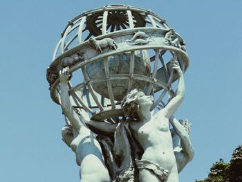Low angle view of built structure against blue sky