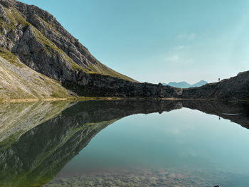 Scenic view of lake boé  in the dolomite mountains against sky, south tyrol , italy