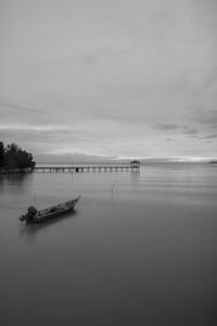 View of pier on calm lake