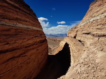 Scenic view of rock formations against sky