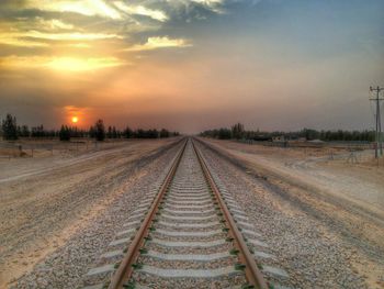 Railroad track at sunset