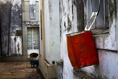 Man in red building