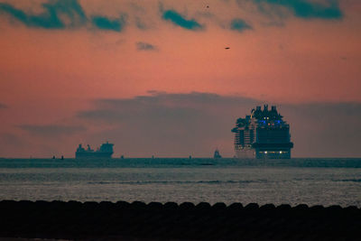 Scenic view of sea against sky during sunset