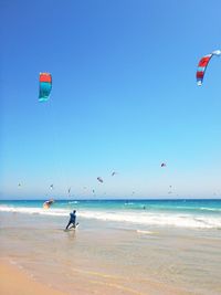 Scenic view of beach against clear sky