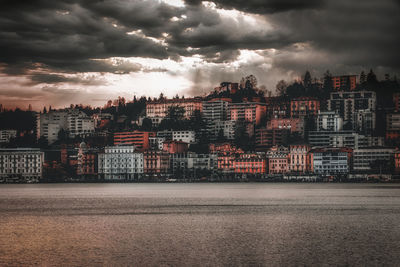 Buildings against dramatic sky