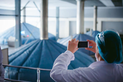 Close-up of woman using mobile phone