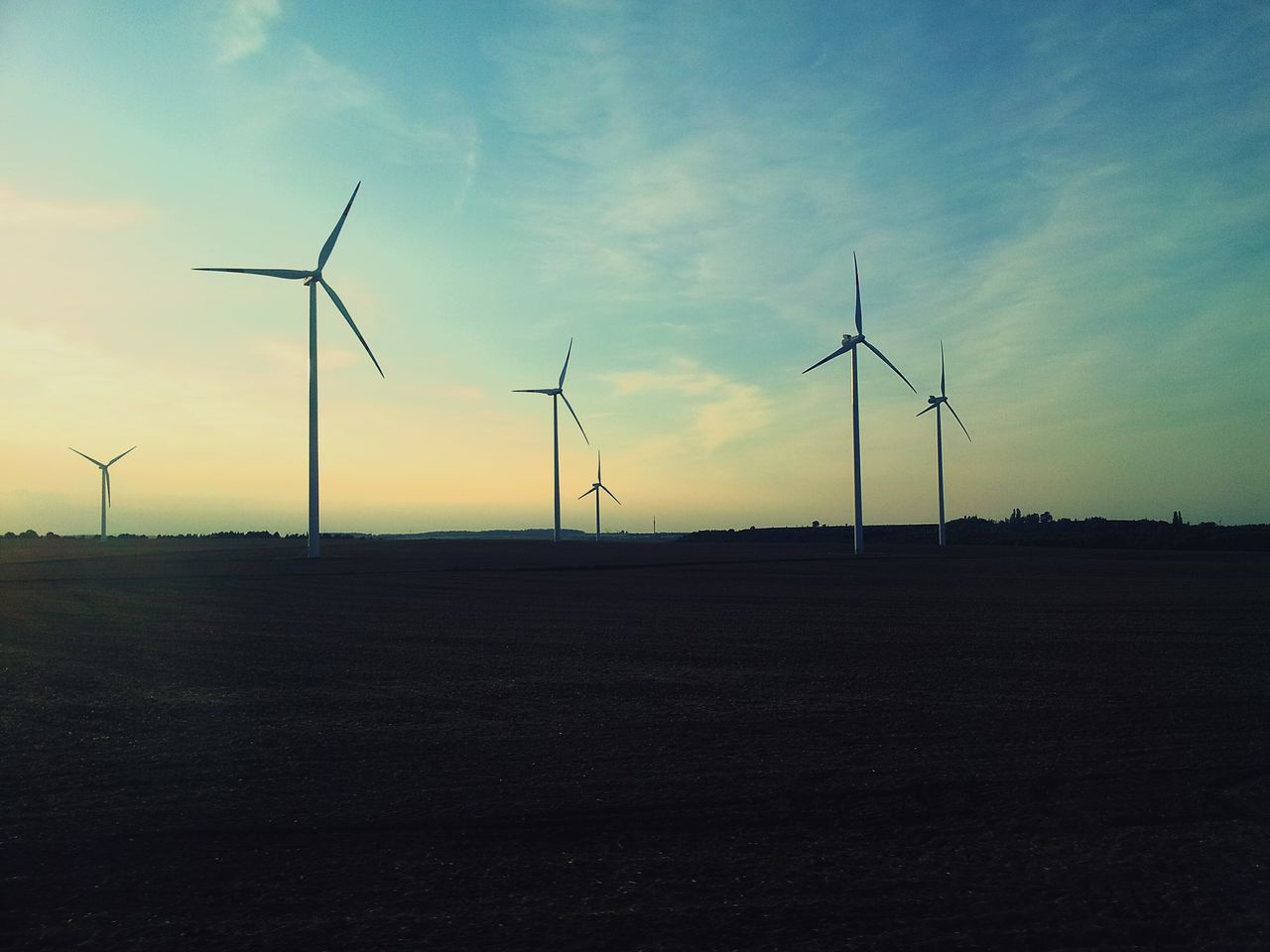 fuel and power generation, wind turbine, wind power, alternative energy, landscape, environmental conservation, windmill, renewable energy, field, rural scene, sunset, sky, tranquil scene, technology, tranquility, electricity pylon, scenics, silhouette, electricity, nature