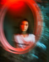 Portrait of woman photographing