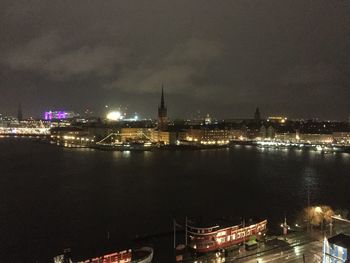 Illuminated cityscape at night