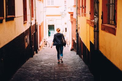 Full length of woman walking in city