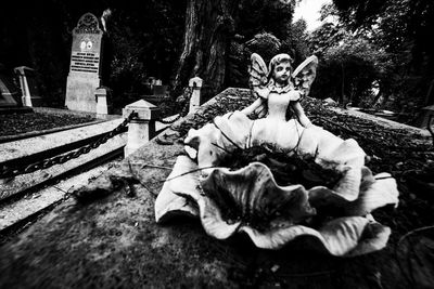 Statue of angel in park