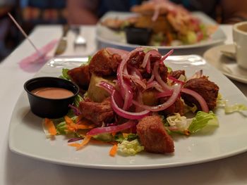 Close-up of served food in plate