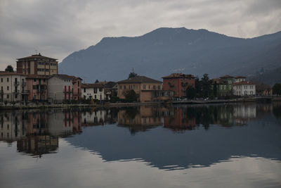 Scenic view of lake and mountains against sky