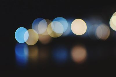 Defocused image of illuminated lights at night