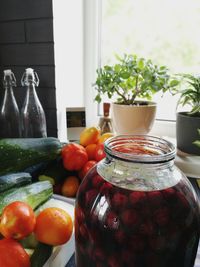 Close-up of fruits in jar