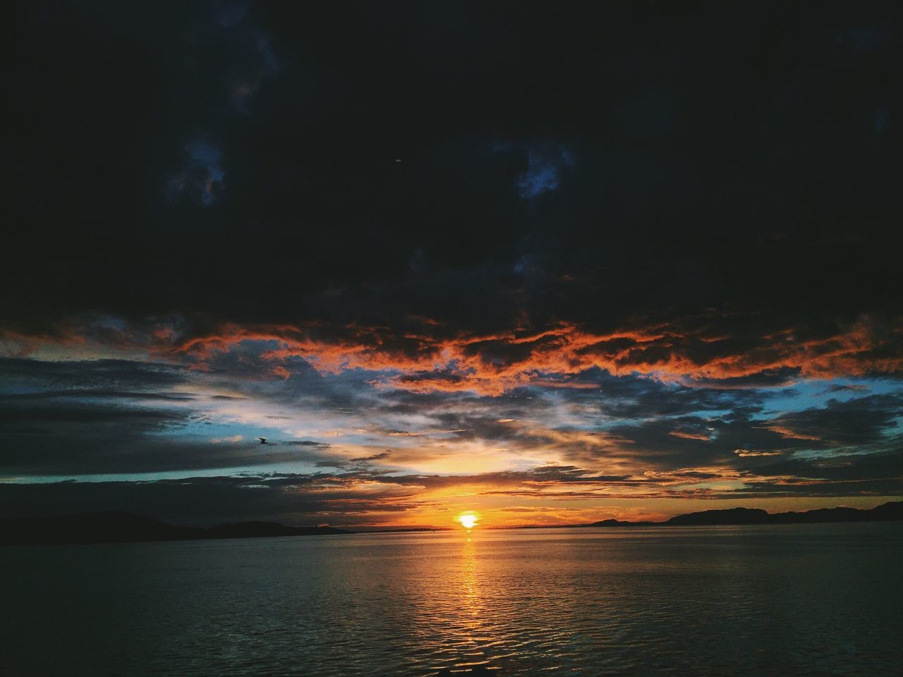 sunset, beauty in nature, scenics, tranquility, nature, sea, sky, tranquil scene, idyllic, dramatic sky, cloud - sky, no people, water, outdoors, horizon over water, waterfront, scenery, day