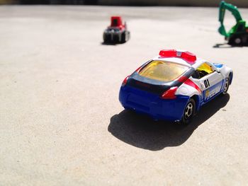 Close-up of toy car on floor