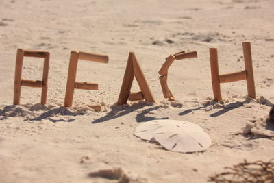 Beach text on sand