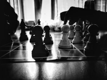 Full frame shot of chess pieces on table