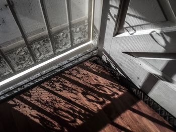 High angle view of shadow on window