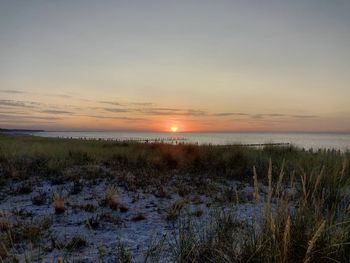 Scenic view of sea against sky during sunset