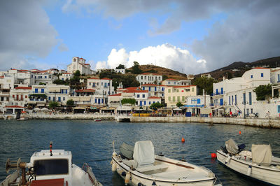 Panoramic view of townscape by sea against sky