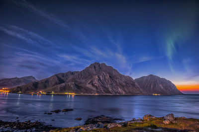 Scenic view of sea against sky at night