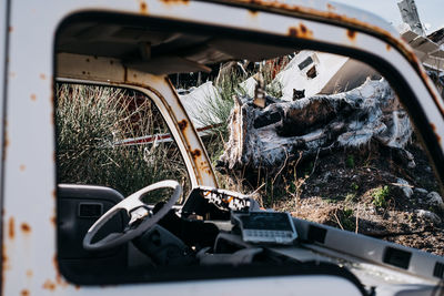 Close-up of abandoned car