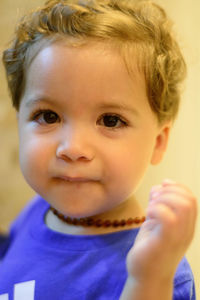 Close-up portrait of smiling boy