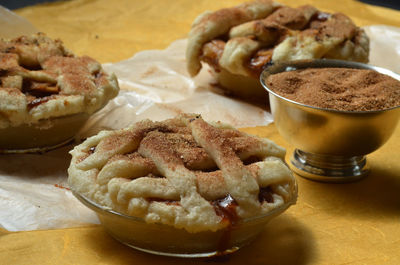 Close-up of apple pies on table