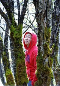 Portrait of young woman in forest